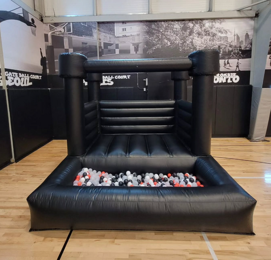 Black Bouncy Castle with Attached Ballpit