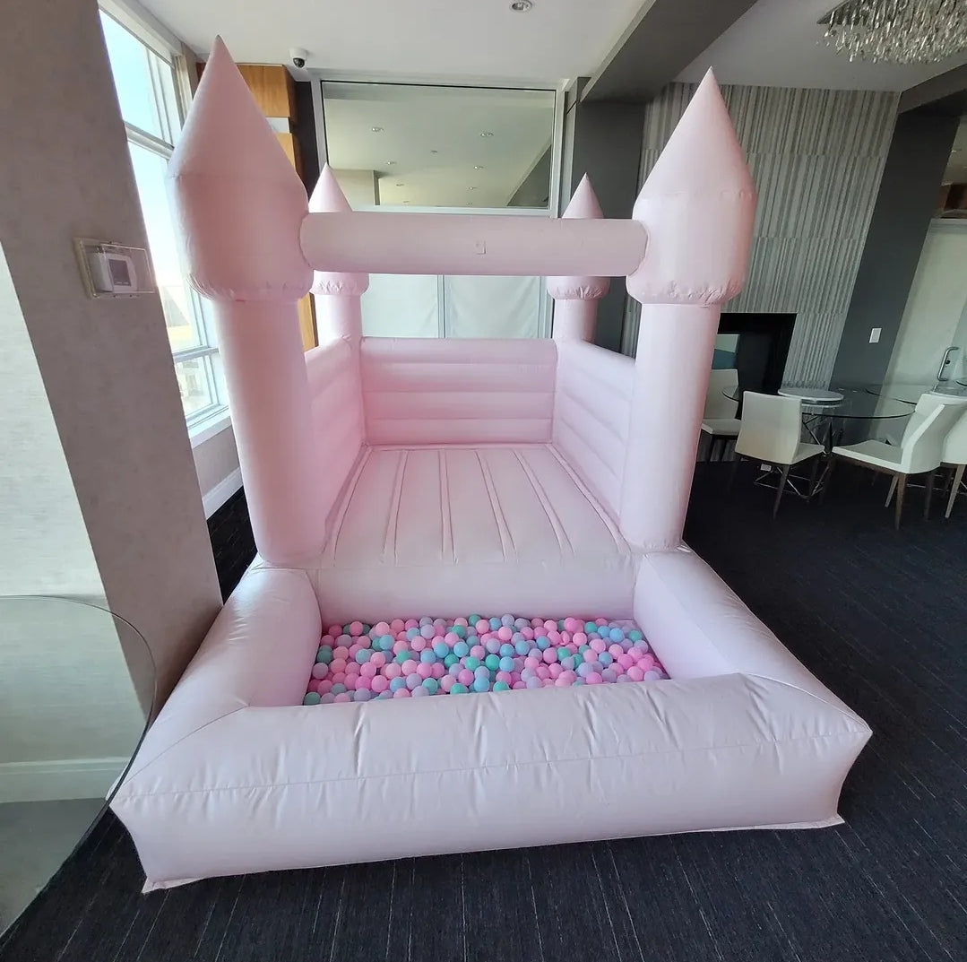 Baby pink Bounce House + Attached ballpit (new)