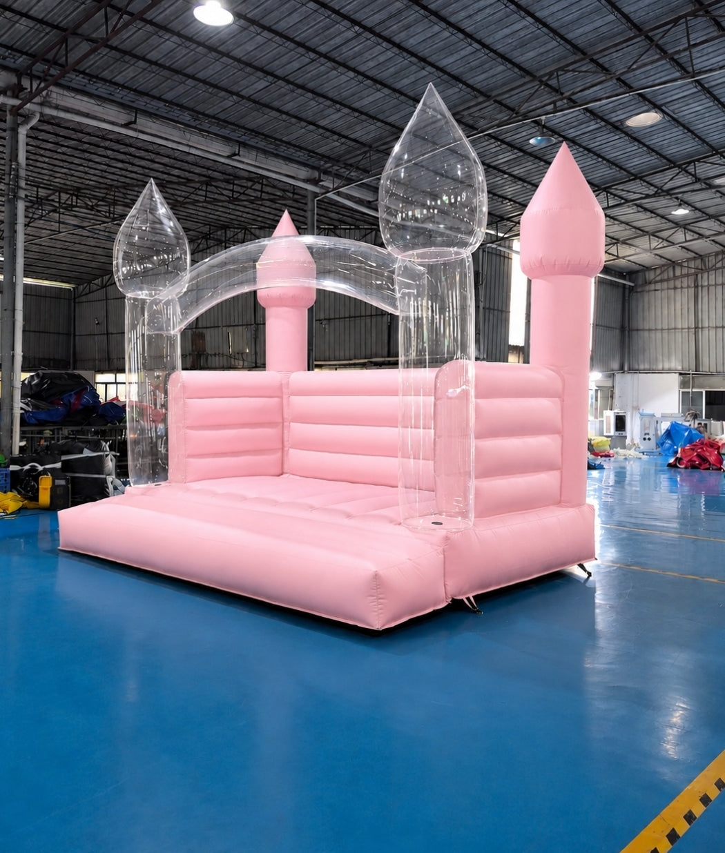 Pink bounce house with colorful customizable balloon pillars, inflatable play structure by Aura Luxury Rental Ltd