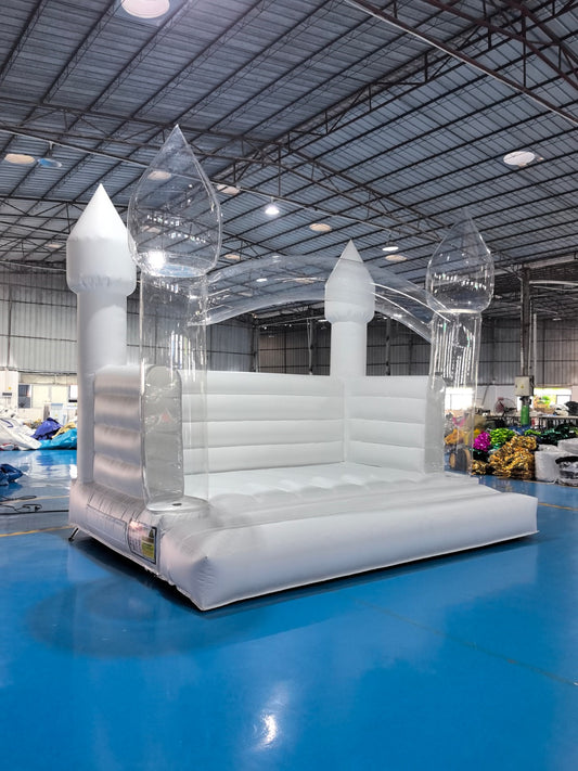 Colorful Balloon Pillar Bounce House by Aura Luxury Rental Ltd with vibrant inflatable structure for kids' entertainment.